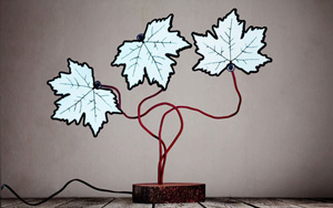 A lamp where the lights are shaped like maple leaves